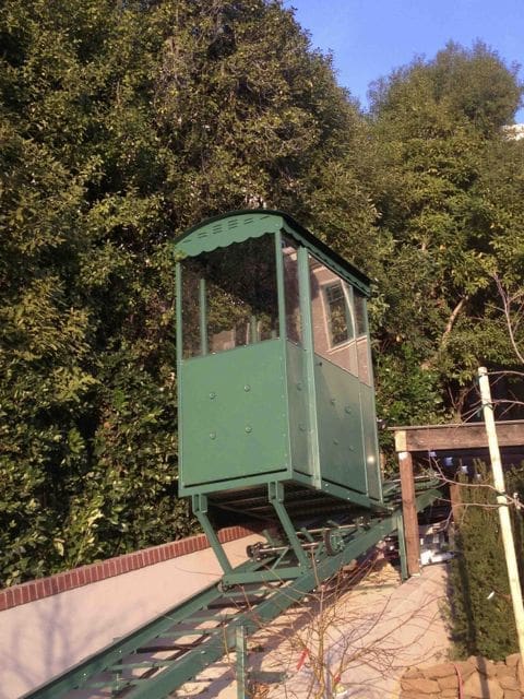 Custom Hill Hiker enclosed carriage with sheet-metal body on captured rail